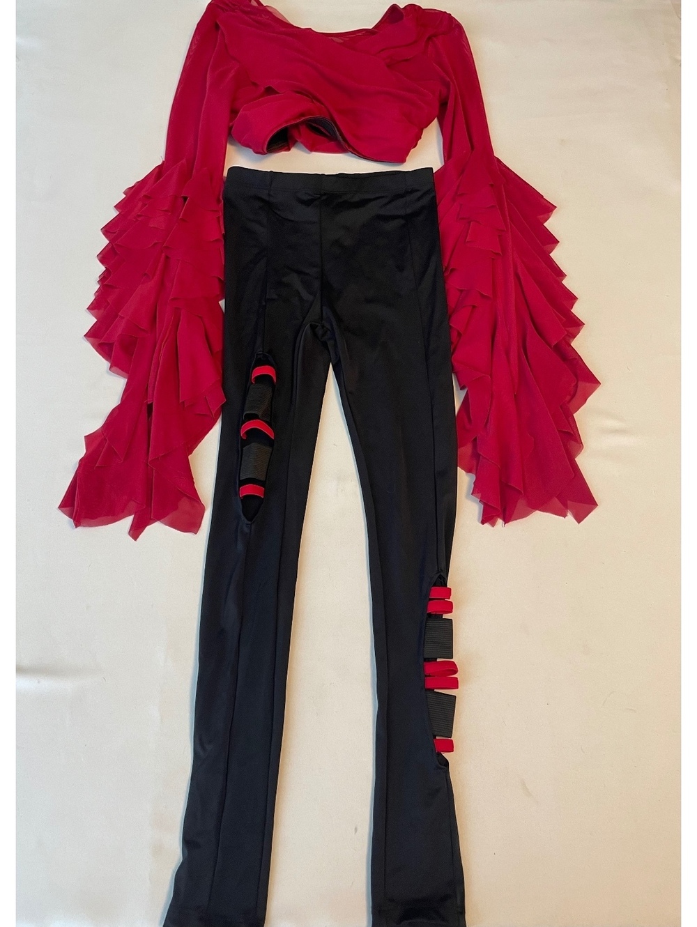 Tenth House Dance Set with Red Ruffled Crop Top and Black Leggings